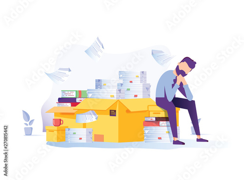 Tired businessman sitting on the pile of documents clutching his head with the piles of paper document around. Overwork