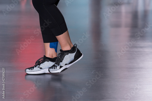 sporty woman doing aerobics exercises