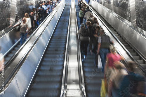 escalator. stairs. People go on escalators in different directions. Instructions for using the escalator.