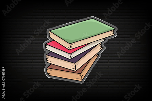 Colored glass symbol of heap of books or notepad in style of cartoon on background of bricks wall