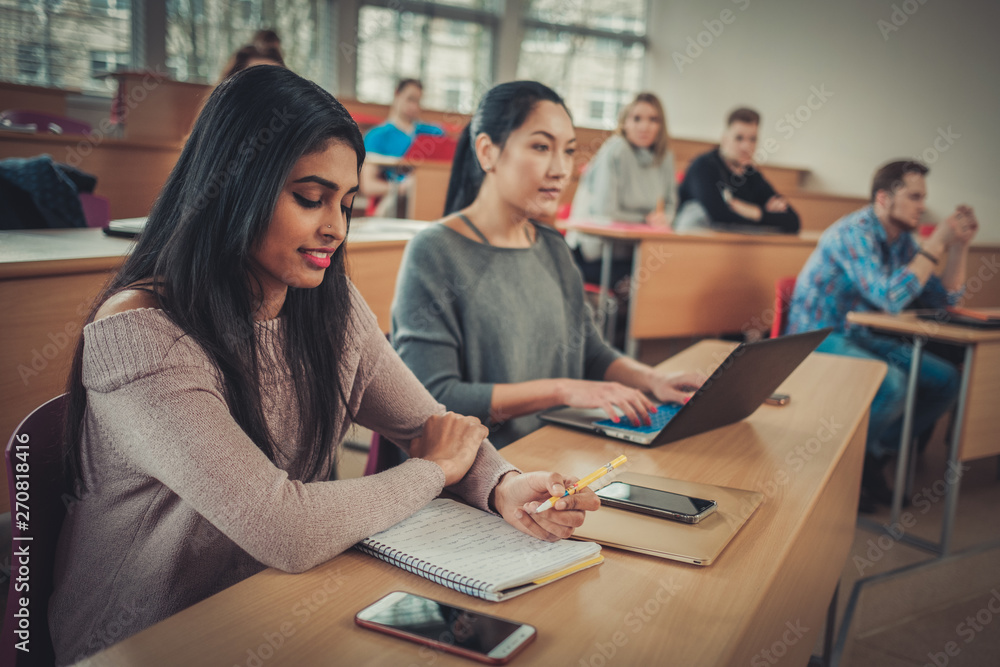 Multinational group of students in an auditorium