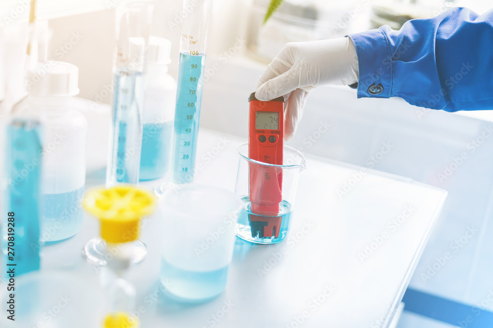 Analysis of water quality in a chemical laboratory, a device for measuring pH with equipment made of glass Analysis of water quality in a chemical laboratory, a device for measuring pH with equipment made of glass