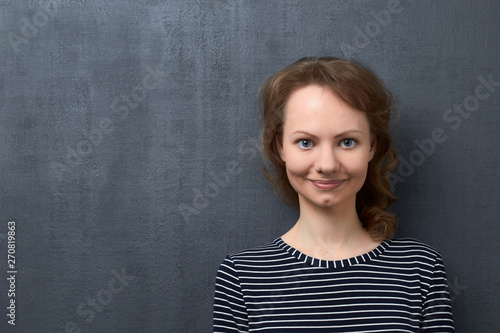 Studio portrait of happy smiling girl © Andrei Korzhyts
