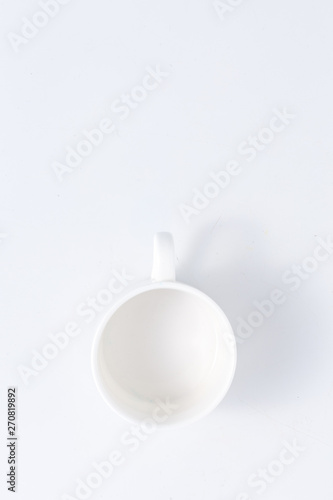 Empty cup of coffee on the table. Top view