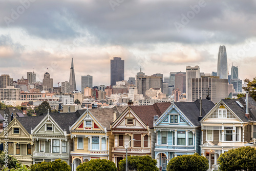 Pastel Village - Backed by the city of San Francisco, California, the Victorian era houses near Alamo Square Park, are painted in multiple colors to accentuate their architectural details.