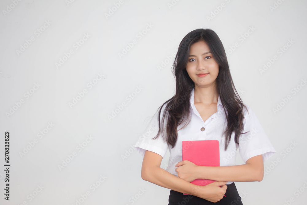 Portrait of thai adult student university uniform beautiful girl read red book Portrait of thai adult student university uniform beautiful girl read red book