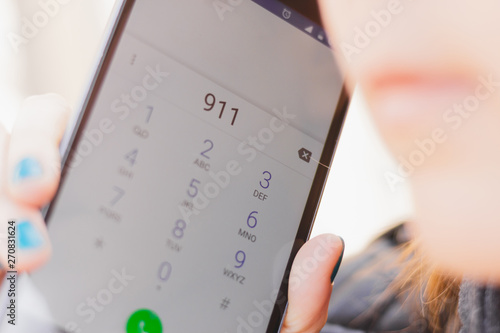 Smartphone screen with the emergency number 911 dialed – Person calling the support service phone line asking for help