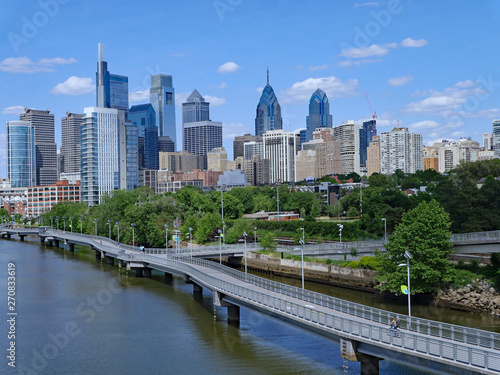 Philadelphia skyline in 2019 with recreational boardwalk along the Schuylkill River, known as the Schuylkill Banks