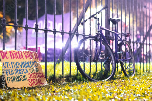 Sign resting against iron bars during a march for legal abortion in Buenos Aires, Argentina, March 28,2019