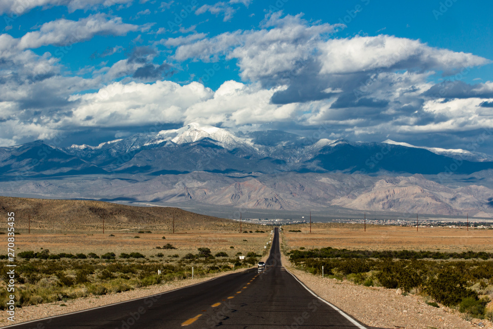 Long highway leading from Death Valley National Park to Nevada, USA Long highway leading from Death Valley National Park to Nevada, USA