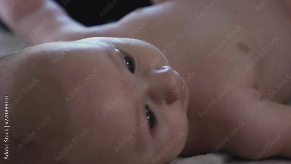 Little baby boy is lying in his cradle. Little baby boy is lying in his cradle.