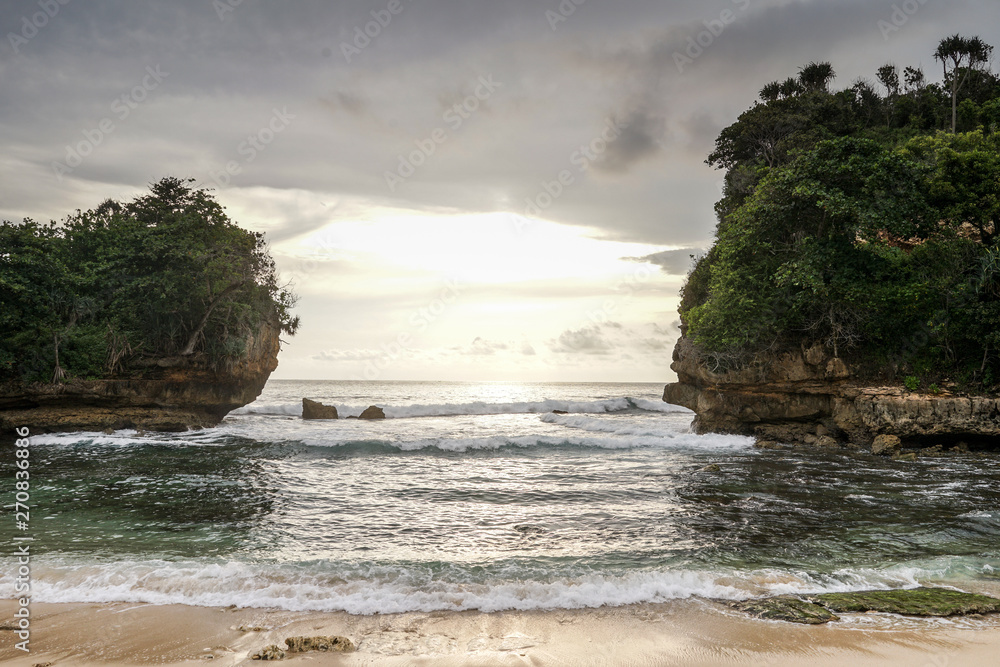 Beautiful landscape of Batu Bengkung Beach in Malang, East Java, Indonesia. Scenic view of beach Beautiful landscape of Batu Bengkung Beach in Malang, East Java, Indonesia. Scenic view of beach