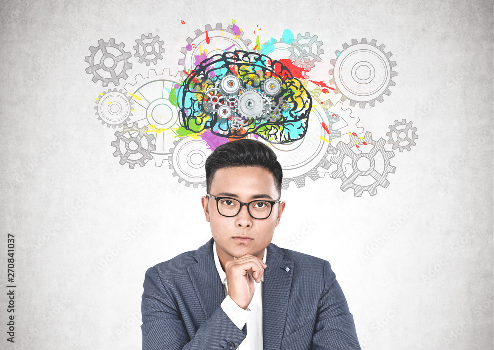 Asian businessman in glasses, gear brain Asian businessman in glasses, gear brain