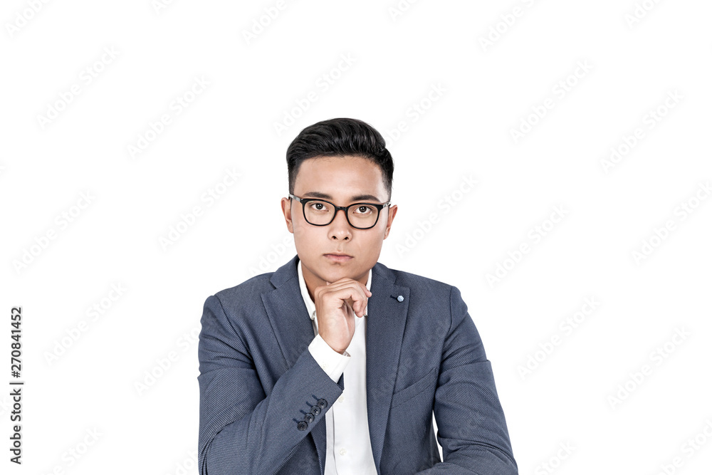 Pensive Asian businessman in glasses, isolated Pensive Asian businessman in glasses, isolated