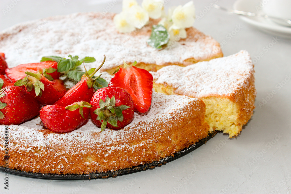 Orange cake decorated with strawberries Orange cake decorated with strawberries