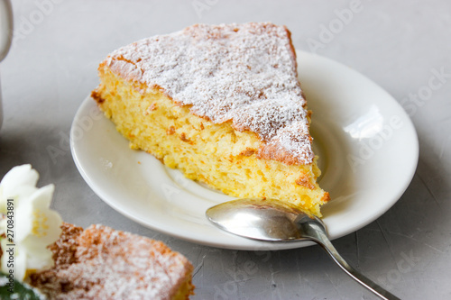 Orange cake decorated with strawberries