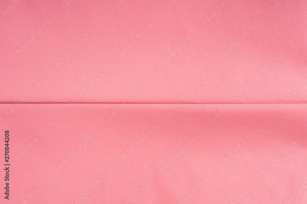 Fototapeta premium Pink coral wrapping paper background with crease texture. Geometry abstract art concept backdrop.