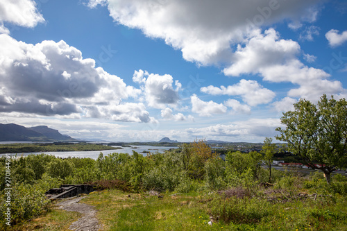 White clouds  on mountains and landscape - Torghatten in Northern Norway photo