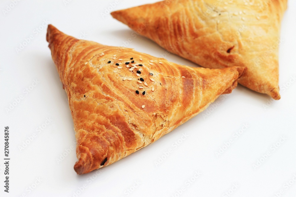 Isolated samosa on white background, Eastern food. Isolated samosa on white background, Eastern food.