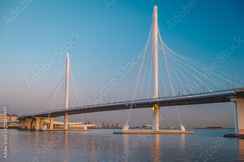 Cable-stayed bridge across the ship's fairway, St. Petersburg, Russia Evening, sky, sunset, urban view, cityscape, horizontal, sight, tourism, tourist object