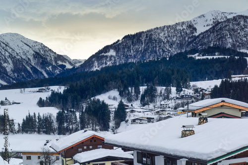 Photography TYROL, AUSTRIA: Alpine landscape with houses and snow in winter.