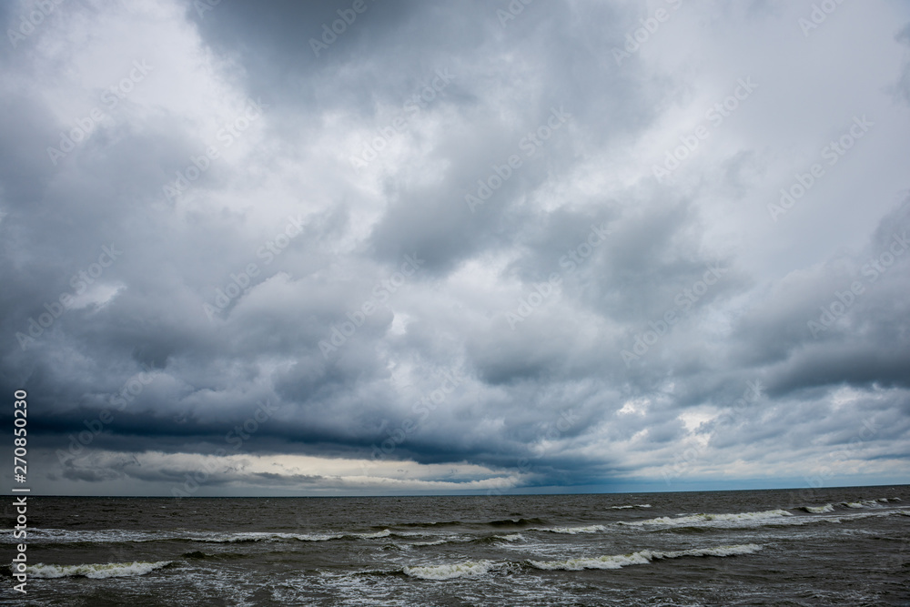 storm on the rocky sea beach