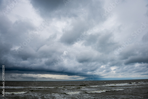storm on the rocky sea beach