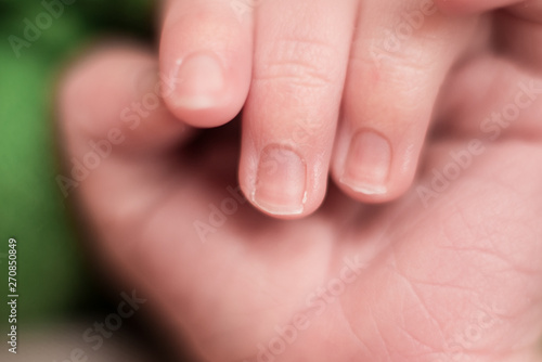 nails on the hand of a newborn baby, cute, body parts, macro shot, close-up, selective focus