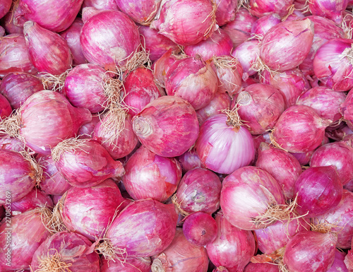 raw red onions close up top view, organic food background