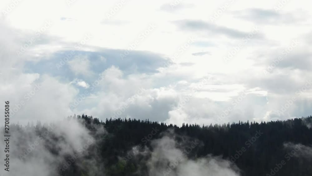 Clouds above mountain tops. High peaks wonderful natural Landscape Clouds above mountain tops. High peaks wonderful natural Landscape