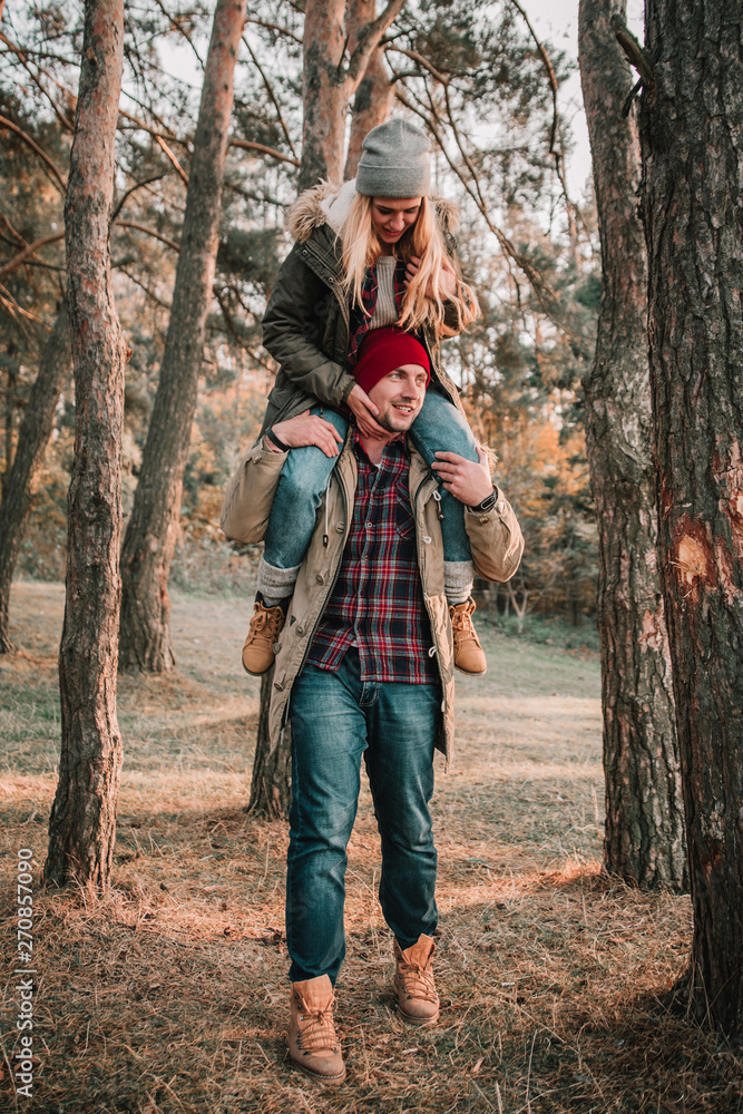 Couple travelers is looking happy in the highlands. Concept of trekking, adventure and seasonal vacation. Couple travelers is looking happy in the highlands. Concept of trekking, adventure and seasonal vacation.
