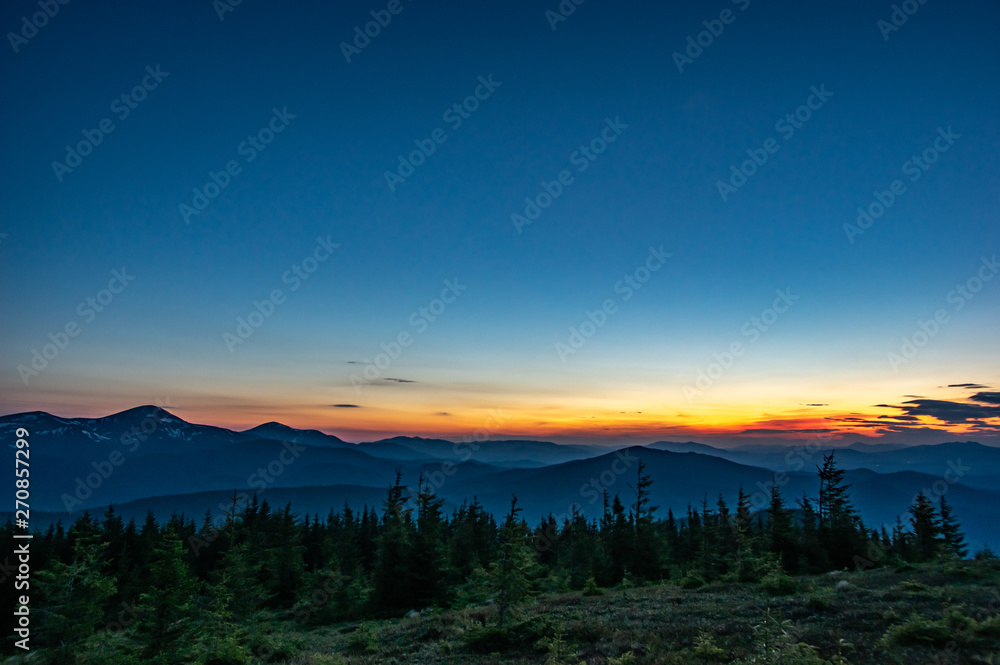 Sunset in the spring in the mountains