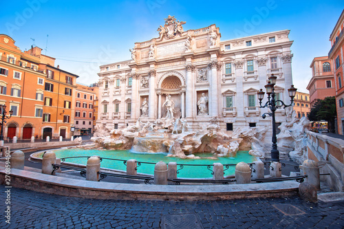 Majestic Trevi fountain in Rome street view photo