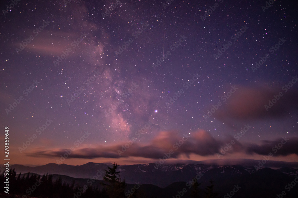 Milky Way on the starry sky in the mountains