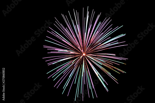 multicolored fireworks with blue and red sparks on an isolated black background for design decoration of the holidays  the new year  as well as the independence day on July 4