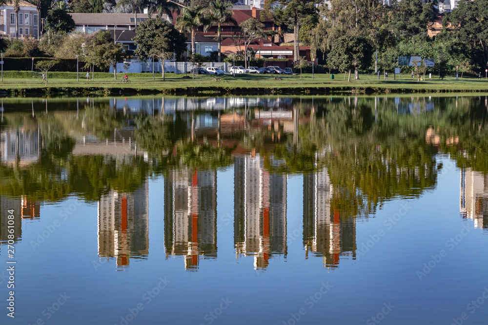 Buildings reflecting on the pond