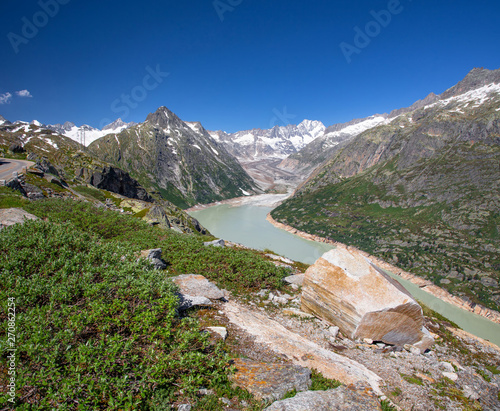 Swiss beauty, milked water of Grimselsee, Switzerland, Europe photo