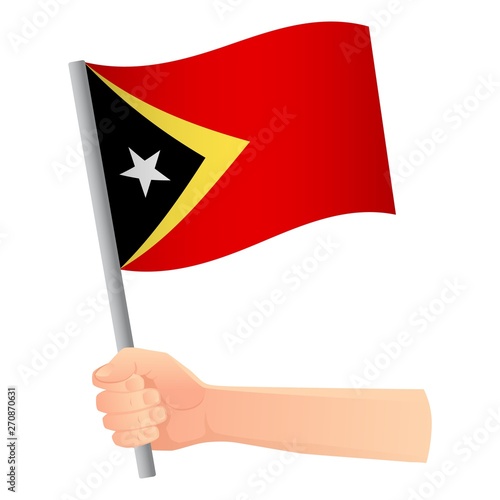 East Timor flag in hand © Visual Content