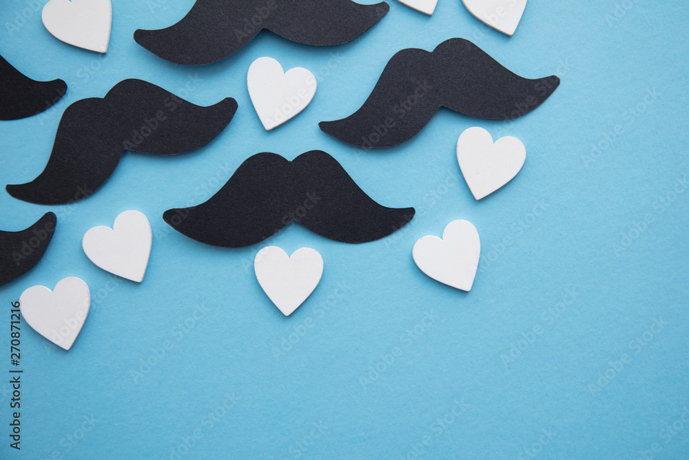 Black mustache with love hearts. Father's day or mens health concept Black mustache with love hearts. Father's day or mens health concept