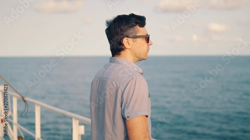 Marine navigational officer during navigational watch on Bridge . Work at sea photo