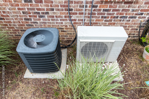 Obraz na płótnie HVAC Air Conditioner Compressor and a Mini-split system together