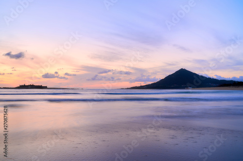 Beach of moledo at the end of the day, with a view to trega mountain on spanish side of the border. Low tide displaying the sandy beach on a cloudy day. © Aldrin