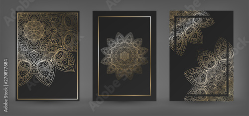 Set of black rich background with a gold round patterns, shiny mandalas, oriental background