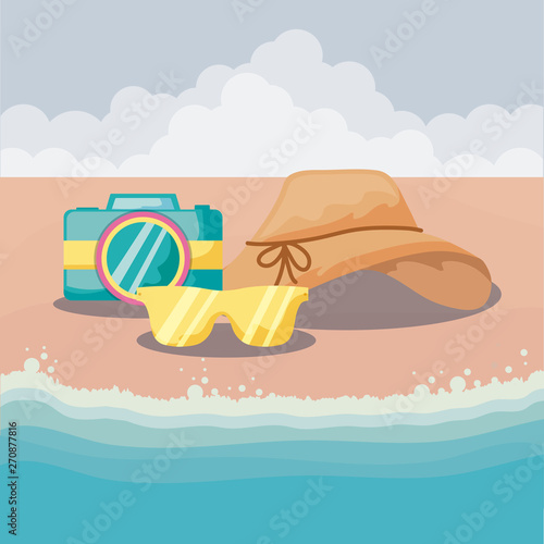 summer holiday with camera and accessories in beach