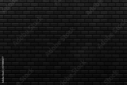 Black brick stone wall seamless background and texture