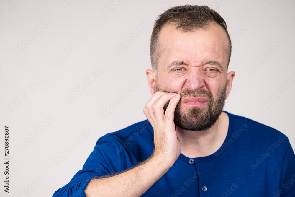 Man having tooth pain Man having tooth pain