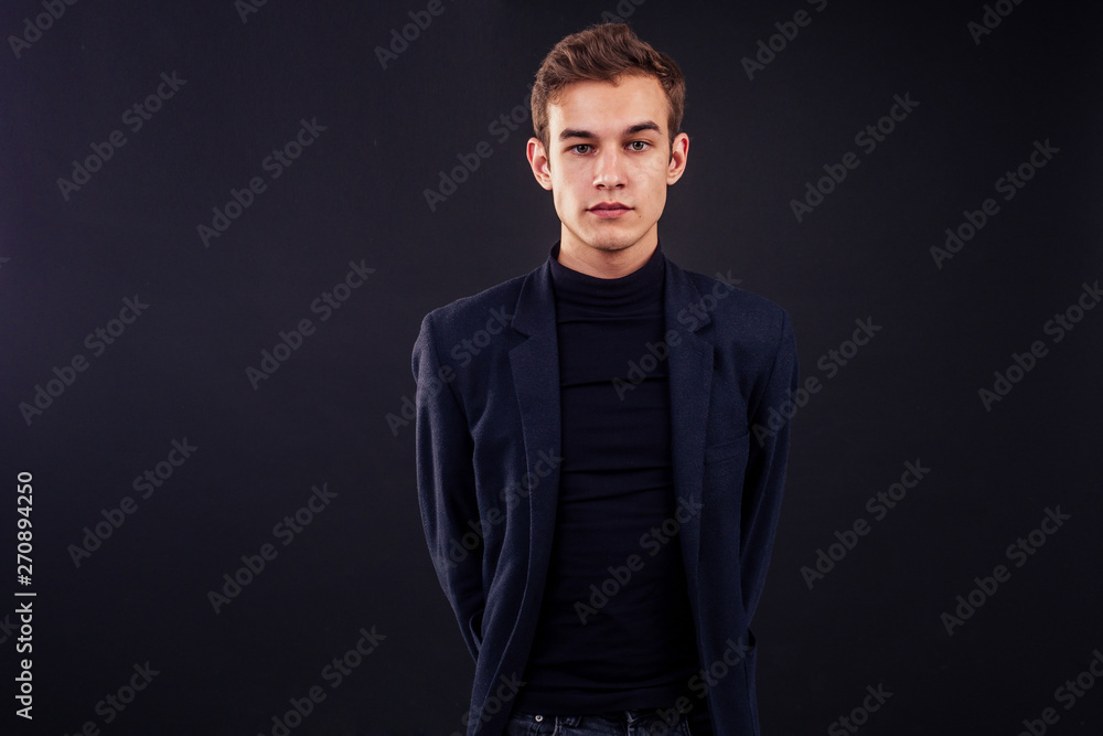 fashion man asymmetric facial features ears in suit black background studio fashion man asymmetric facial features ears in suit black background studio