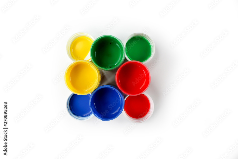 Set gouache paints for children isolated on a white background Set gouache paints for children isolated on a white background