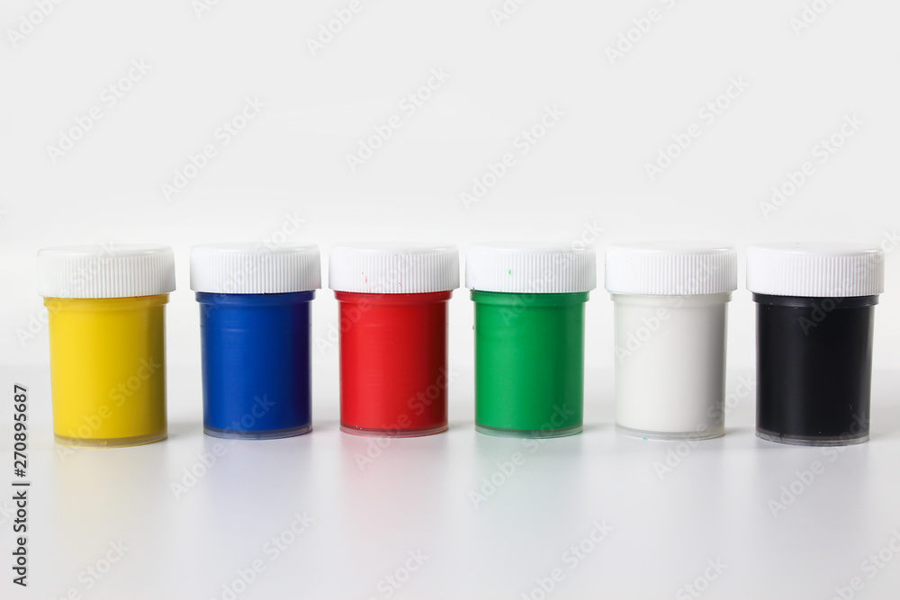 Set gouache paints for children isolated on a white background Set gouache paints for children isolated on a white background