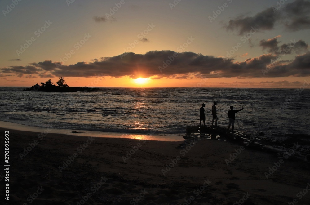 Dusk and sun setting over a beautiful ocean Dusk and sun setting over a beautiful ocean